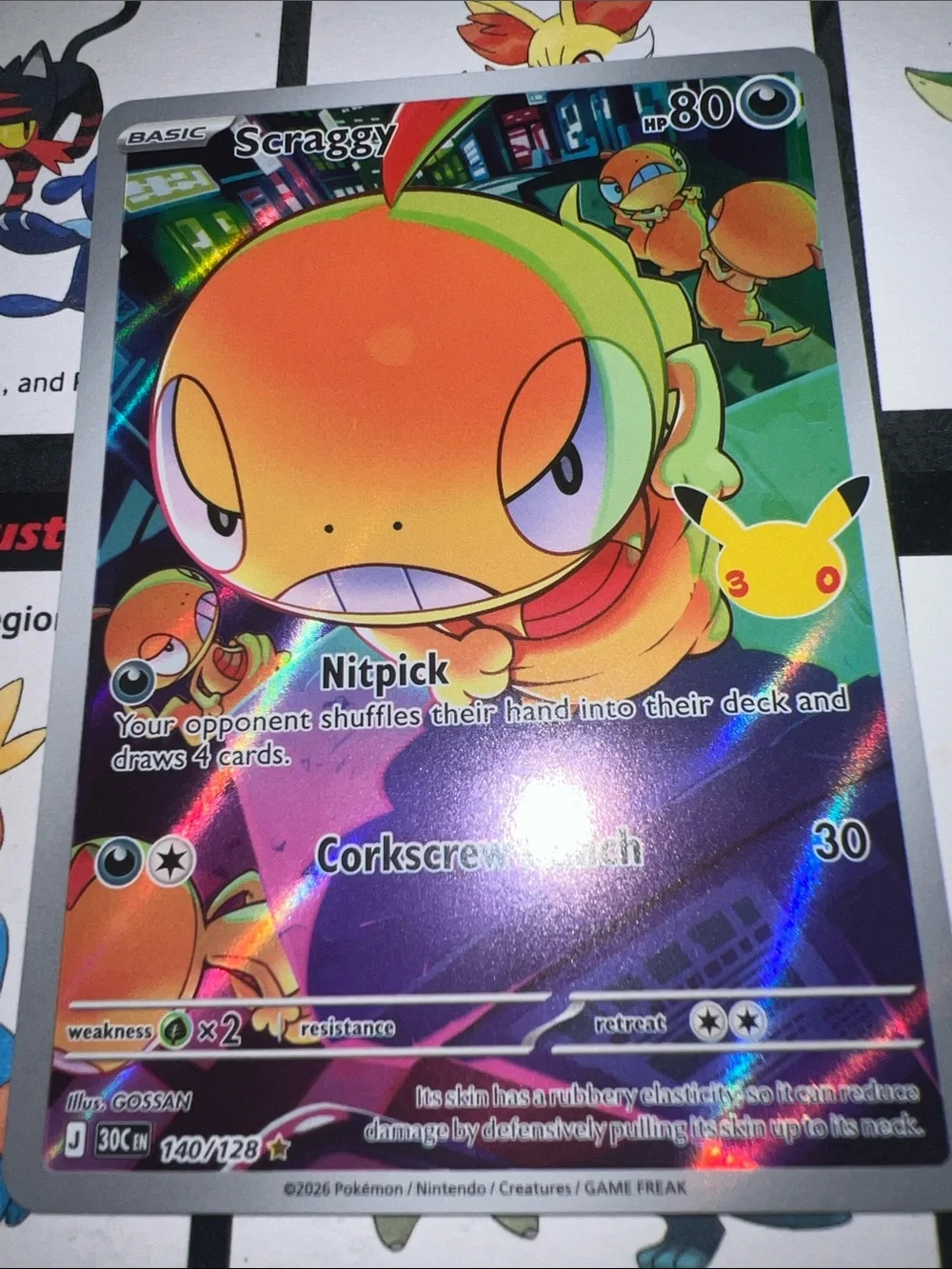 Pokemon Holofoil Scraggy Card - Orange & Green